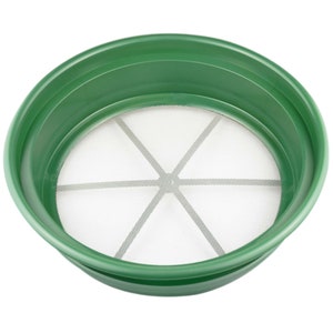 May include: A green plastic panning dish with a white mesh screen. The screen has six spokes radiating from the center.