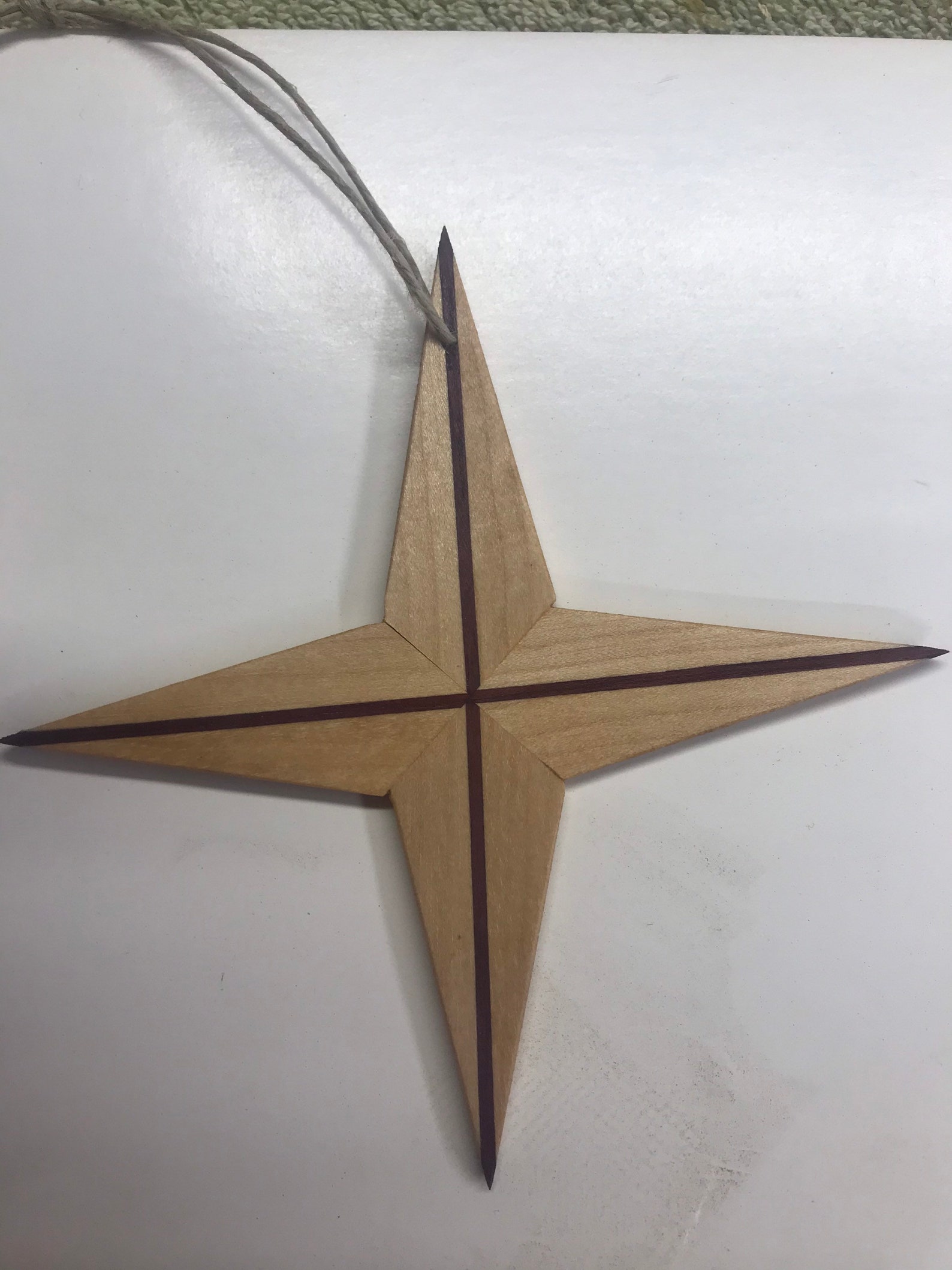 Wooden black star ornament