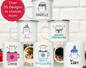 May include: Six white enamel mugs with different designs featuring a marshmallow character. The mugs have names like "Isadell", "Ava", "Emma", "Oliver's Hot Cocoa Mug", "Jackson's Christmas Mug", and "Liam".