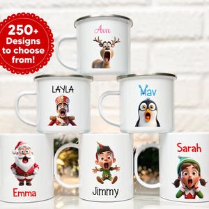 May include: White enamel mugs with various cartoon characters and names printed on them. The mugs feature designs like a reindeer, penguin, and Santa Claus. The image also includes a red circle with the text "250+ Designs to choose from!"