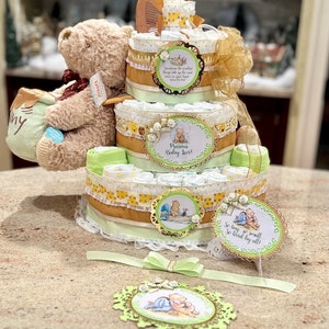 Premium 4 Tier Musical Winnie the Pooh Diaper Cake with 12 inch Stuffed Winny, Pacifiers, Brush/Comb Set, Washcloths, Signs and Cake Topper