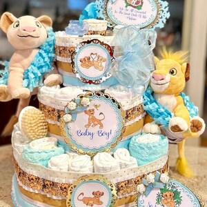 Envío al día siguiente, pastel de pañales de El Rey León con peluches de Simba y Nala, chupetes, cepillo/peine, toallitas, letreros para pastel, tarjeta de mesa y adorno para pastel.