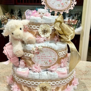 Premium 4 Tier Lamb Diaper Cake With Stuffed Lamb, Pink Crib Shoes, Pacifiers, Brush/Comb Set, Washcloths, Decorative Signs and Cake Topper