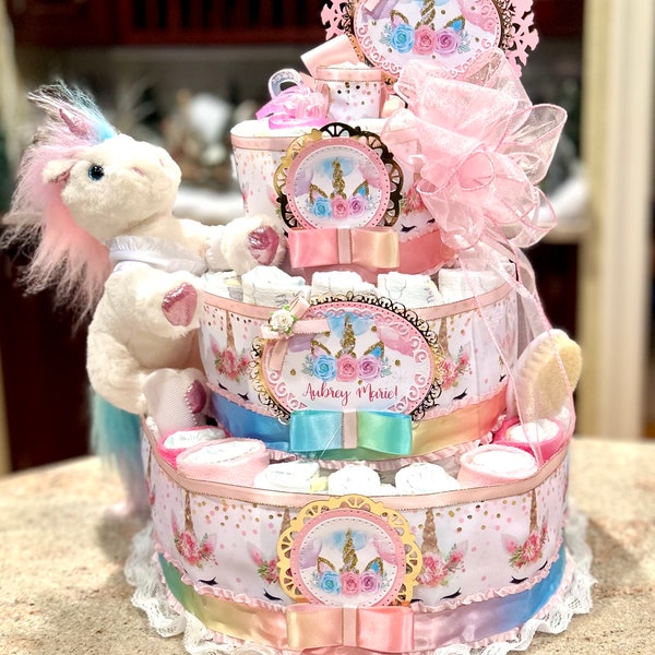 Premium 4 Tier Unicorn  Diaper Cake With 10" Stuffed Animal, Pacifiers, Brush and Comb Set, Washcloths and Matching Cake Topper