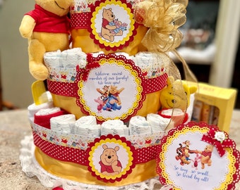 Winnie the Pooh Diaper Cake w/Plush Winnie Bear, Pacifiers, Brush/Comb,  Washcloths, Story Images, Table Card, and Cake Topper, Tiers