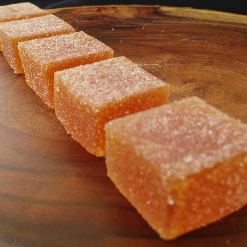Passion Fruit Pate de Fruit
cubes of tart passion fruit pectin jelly coated in a citric acid sugar
total weight is about 4-5 ounces.  This candy features a gummy texture and is vegan