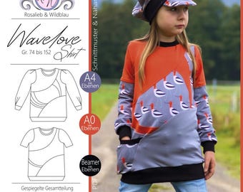 May include: A child wearing an orange and gray long-sleeved shirt with a bird pattern, paired with a matching hat and blue jeans. The shirt design includes the text "Wave Love Shirt" and "Gr. 74 bis 152".