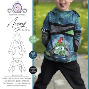 Könnte beinhalten: Ein Kapuzenpullover mit grün-blauem Galaxie-Druck, einer Comic-Figur auf der Vorderseite, schwarzen Abschlüssen und langen Ärmeln. Das Design umfasst ein überkreuztes Brustdetail, eine Fronttasche und eine Kapuze.