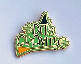 Wicked the musical Elphaba inspired hard enamel pin - "defy gravity" 1inch musical theatre enamel pin