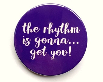 On Your Feet the Emilio and Gloria Estefan musical inspired button/badge or magnet  - "the rhythm is gonna get you"