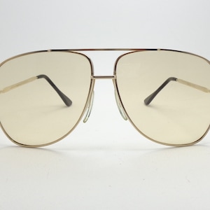 Polaroid Lookers 4930 vintage sunglasses Made in France NOS aviator color gold