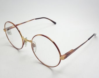 Safilo Elasta vintage jaren 1980 bril dames dames Nieuwe Oude Voorraad Accessoires Zonnebrillen & Eyewear Leesbrillen intense gouden kleur met gele gaten 