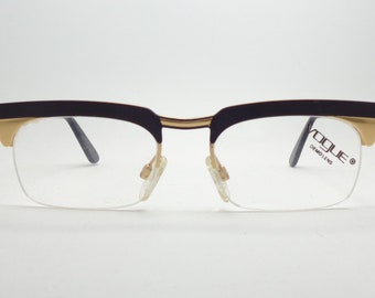 Vogue vintage eyeglasses NOS  color black and gold