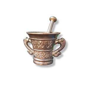 Antique bronze mortar with pestle, Old mortar and pestle