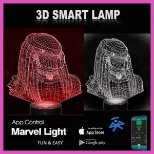 以下が含まれることがあります： Predatorのキャラクターの赤と白のワイヤーフレームデザインの3Dスマートランプ。ランプは、App StoreとGoogle Playで入手可能なアプリで制御されます。画像には、「3D SMART LAMP」と「Marvel Light」のテキストが表示されています。