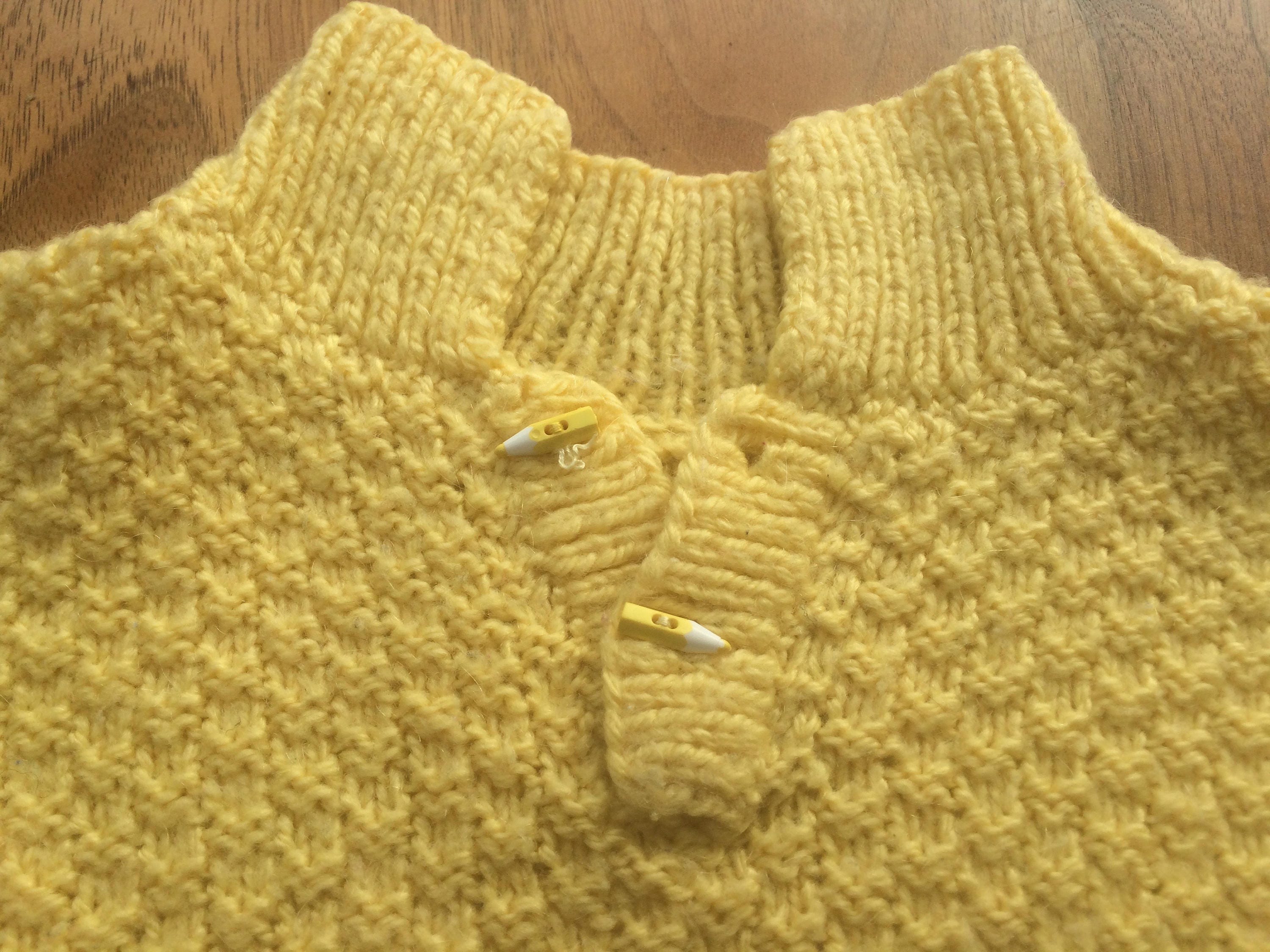 1960s children's wool hand knitted jumper with pencil buttons