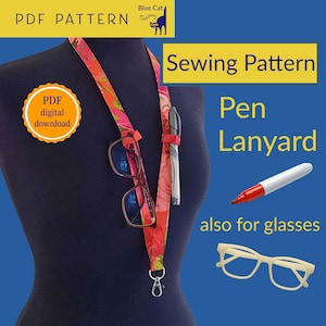 May include: A sewing pattern for a pen lanyard, also for glasses. The pattern is a digital download. The image shows a red and green lanyard with a pen and glasses attached to it.