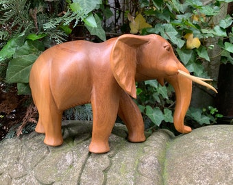 Beautiful elephant made of Sawo wood, hand carved from Africa (collector's item)