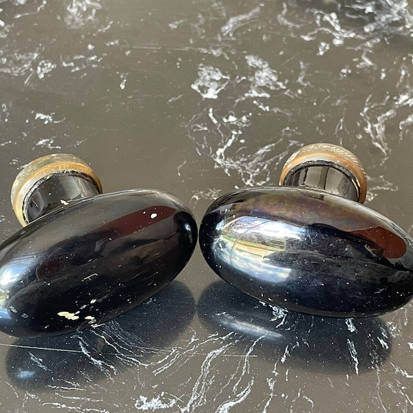 Two old black porcelain door handles - Oval shape.