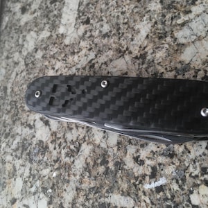 Victorinox huntsman with carbon fiber scales