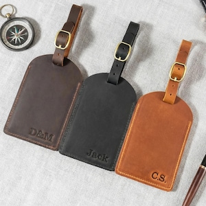 Könnte beinhalten: Ein Set aus drei Keramikbechern mit gesprenkelter, matter Oberfläche. Die Becher sind in den Farbtönen Creme, Hellgrau und Dunkelgrau gehalten. Jeder Becher hat ein schlichtes, minimalistisches Design, ideal für Kaffee oder Tee.