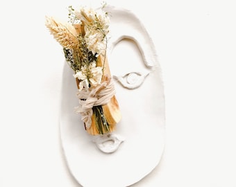 Paquet floral de Palo Santo avec des fleurs séchées