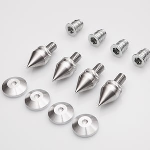 Set of acoustic spikes to improve the sound of your audio system.