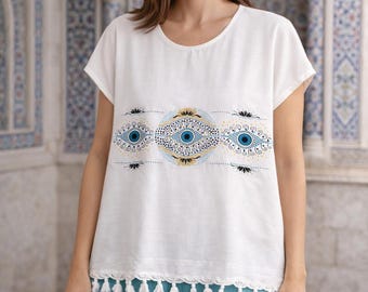 Bestickte weiße Baumwollbluse, Boho-Sommeroberteil für Frauen, Quastensaum-Hemd, ethnischer Stil