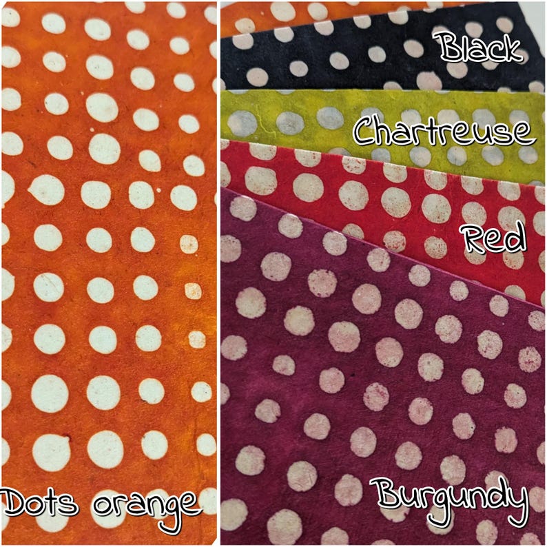 May include: A collection of colorful polka dot paper samples. The colors include orange, black, chartreuse, red, and burgundy. Each sample has white polka dots. The text on the samples reads "Dots orange", "Black", "Chartreuse", "Red", and "Burgundy".