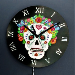 Dia de Los Muertos Calavera,Day of the Dead Skull pendulum clock with Bone  Roman Numerials fun and functional wall decor