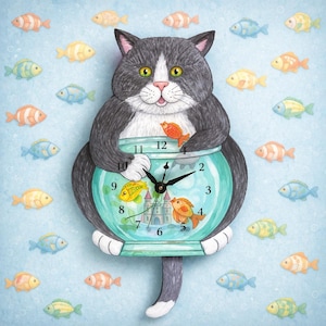 May include: A whimsical cat-shaped wall clock with a fishbowl face. The clock features a gray and white cat holding a fishbowl with colorful fish and a castle. The background is light blue with painted fish.