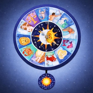 May include: A round, blue wall clock featuring zodiac signs and a celestial design. The clock face displays a sun and moon in the center, surrounded by astrological symbols. A smaller, matching sun-themed pendulum hangs below.