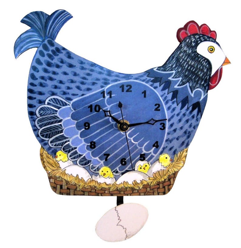 May include: A whimsical wall clock shaped like a blue hen with a red comb. The clock face is integrated into the hen's body, displaying black numbers. A basket with yellow chicks and eggs sits below the clock face, with a cracked egg pendulum.