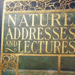 May include: A vintage book titled "Nature Addresses and Lectures" with a gold embossed title and a green and blue cover featuring a seascape with a boat.