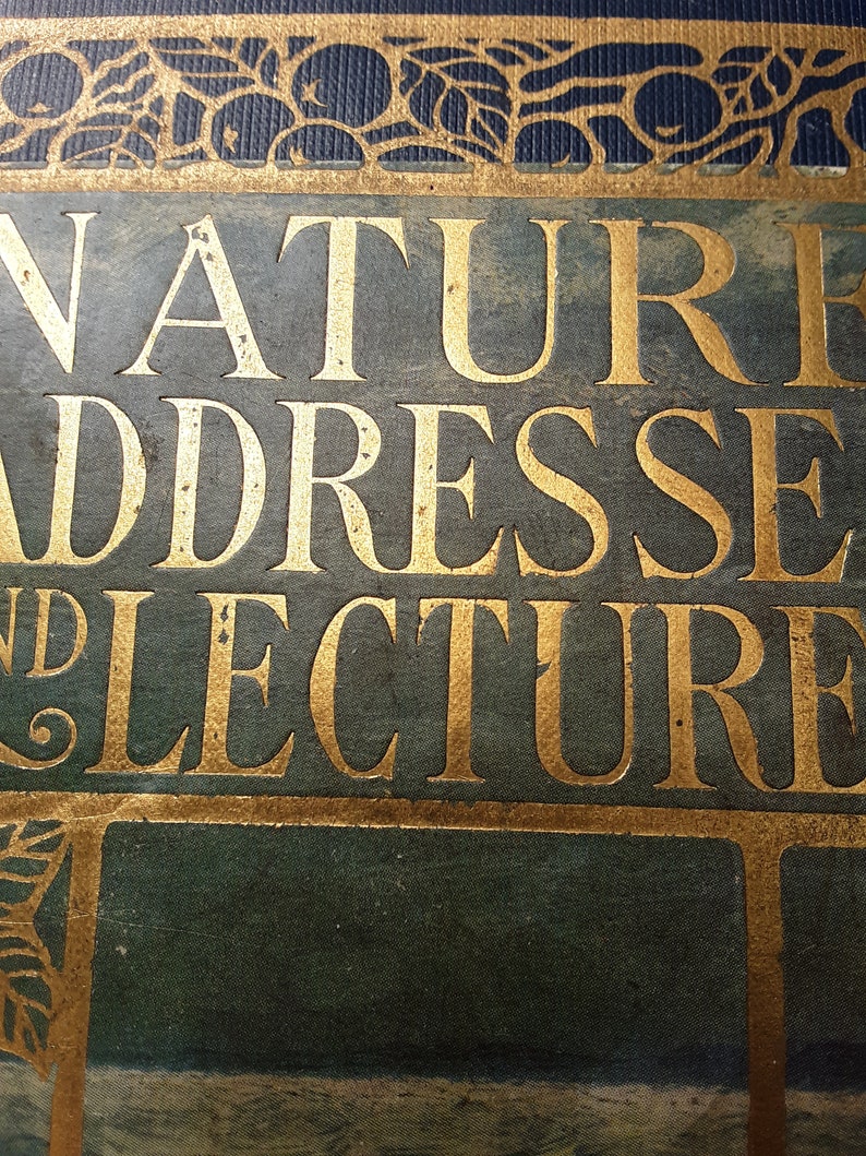 May include: A vintage book cover with the title "Nature Addresses and Lectures" in gold lettering on a dark green background.