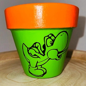 Vaso per piante a forma di dinosauro verde dipinto a mano, vaso per piante retrò da gamer con decalcomania, decorazione nostalgica per la scrivania da gaming, regalo per gli appassionati di videogiochi.