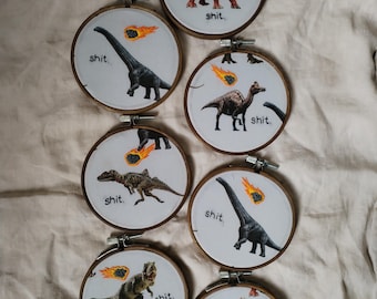 hand-embroidered shit dinosaur embroidery hoop art