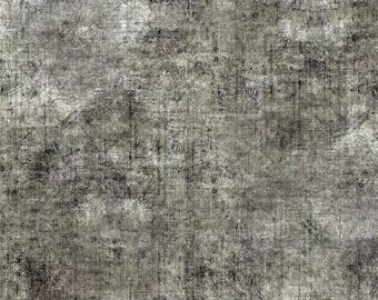 May include: A piece of fabric featuring a distressed, mottled pattern in shades of charcoal grey, slate, and off-white. The surface displays a cross-hatched, textured appearance with dark, scratch-like markings. A ruler measuring 28 cm is visible.