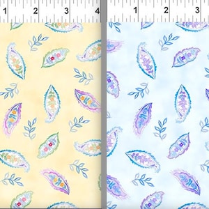 May include: Two fabric swatches with a paisley pattern. The fabric on the left is a light yellow with blue, pink, and purple paisley designs. The fabric on the right is a light blue with blue, pink, and purple paisley designs.