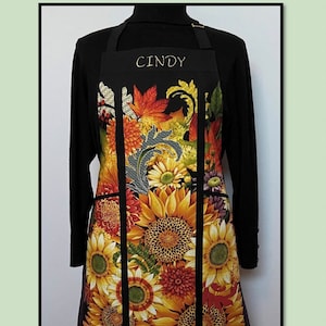 Pattern for a Playing with Panels Apron by J. Minnis Designs. JMD203 Finished size is approximately 25&quot; wide by 30&quot; high.Panel available