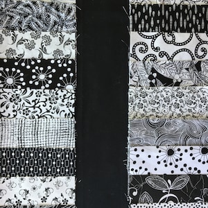 Charm Pack of black and white fabrics from various manufacturers. Substitutions have been made. Some fabrics are different from the picture.