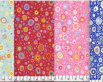 May include: Four fabric swatches with a repeating pattern of colourful circles on a light blue, red, pink, and blue background.