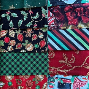 May include: A collection of 16 fabric squares featuring various Christmas-themed patterns. The patterns include snowflakes, candy canes, holly, ornaments, and poinsettias. The fabrics are in shades of red, green, black, and white.
