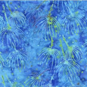 May include: A fabric with a blue and turquoise watercolor background. The fabric has a repeating pattern of white and yellow stylized floral shapes. The design has a batik style appearance.