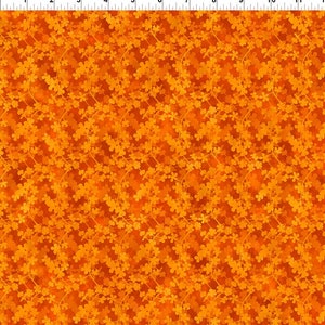 May include: Orange fabric with a repeating pattern of small, stylized orange flowers and branches. The fabric has a subtle watercolor effect.