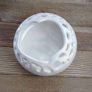 Small white round flower bud vase with built in flower frog for stems. Wide heart shaped opening. Gift for her.