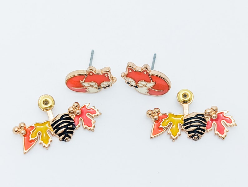 Zoomed out view of the red fox front back earrings, highlighting their length of 0.8" and width of 1".