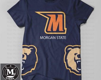 May include: A navy blue t-shirt with a yellow and orange "M" logo and the text "MORGAN STATE". The shirt also features two brown bear heads on the bottom.