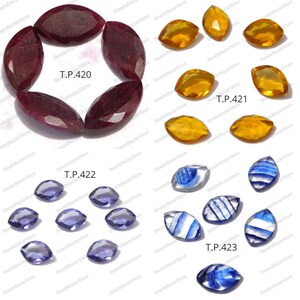 May include: Assortment of gemstone beads in various colors and shapes, including red, yellow, blue, and purple. The beads are arranged in groups with the product code T.P.420, T.P.421, T.P.422, and T.P.423.