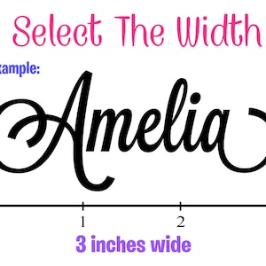 May include: A black and white image showing the name Amelia written in a cursive font. A ruler is shown below the name with markings from 0 to 3 inches. The text "3 inches wide" is written below the ruler.
